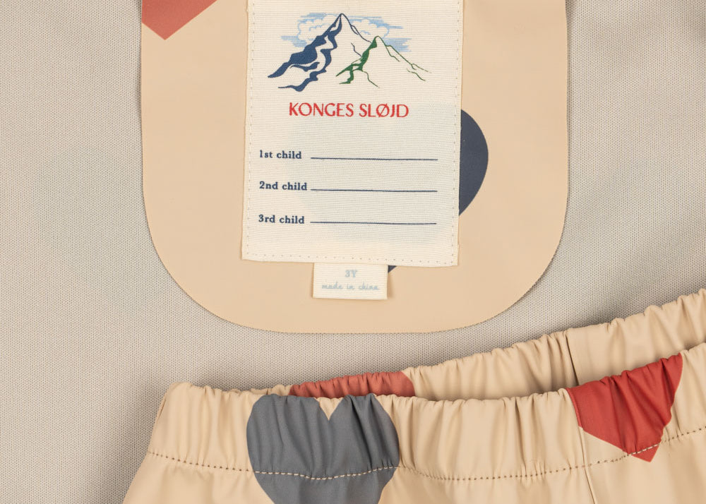 Konges Sløjd A/S Vêtements de pluie bon coeur coloré
